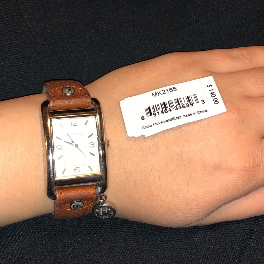 Michael Kors Brown/Tan leather watch.